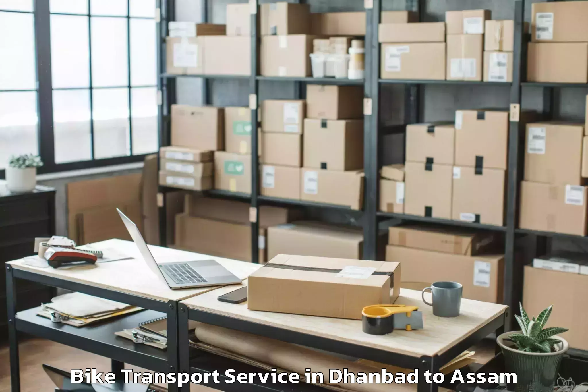 Professional Dhanbad to Samaguri Bike Transport